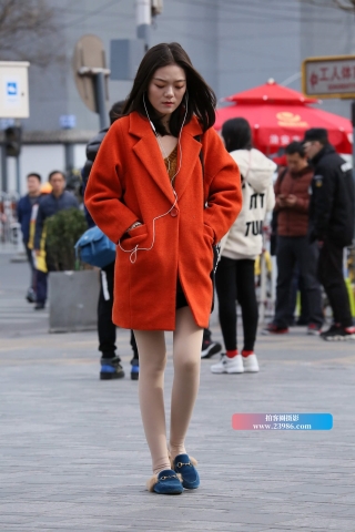 橙色毛呢外套美女